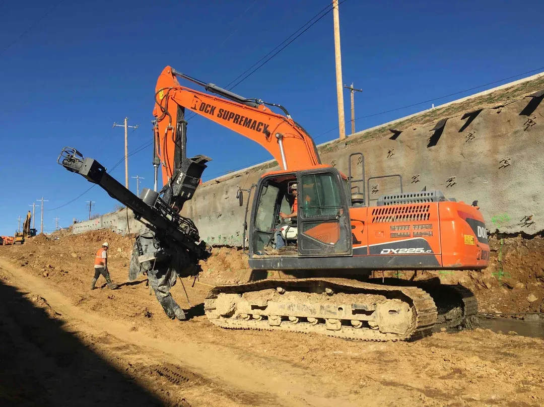 Rock Supremacy excavator drill at soil nail wall